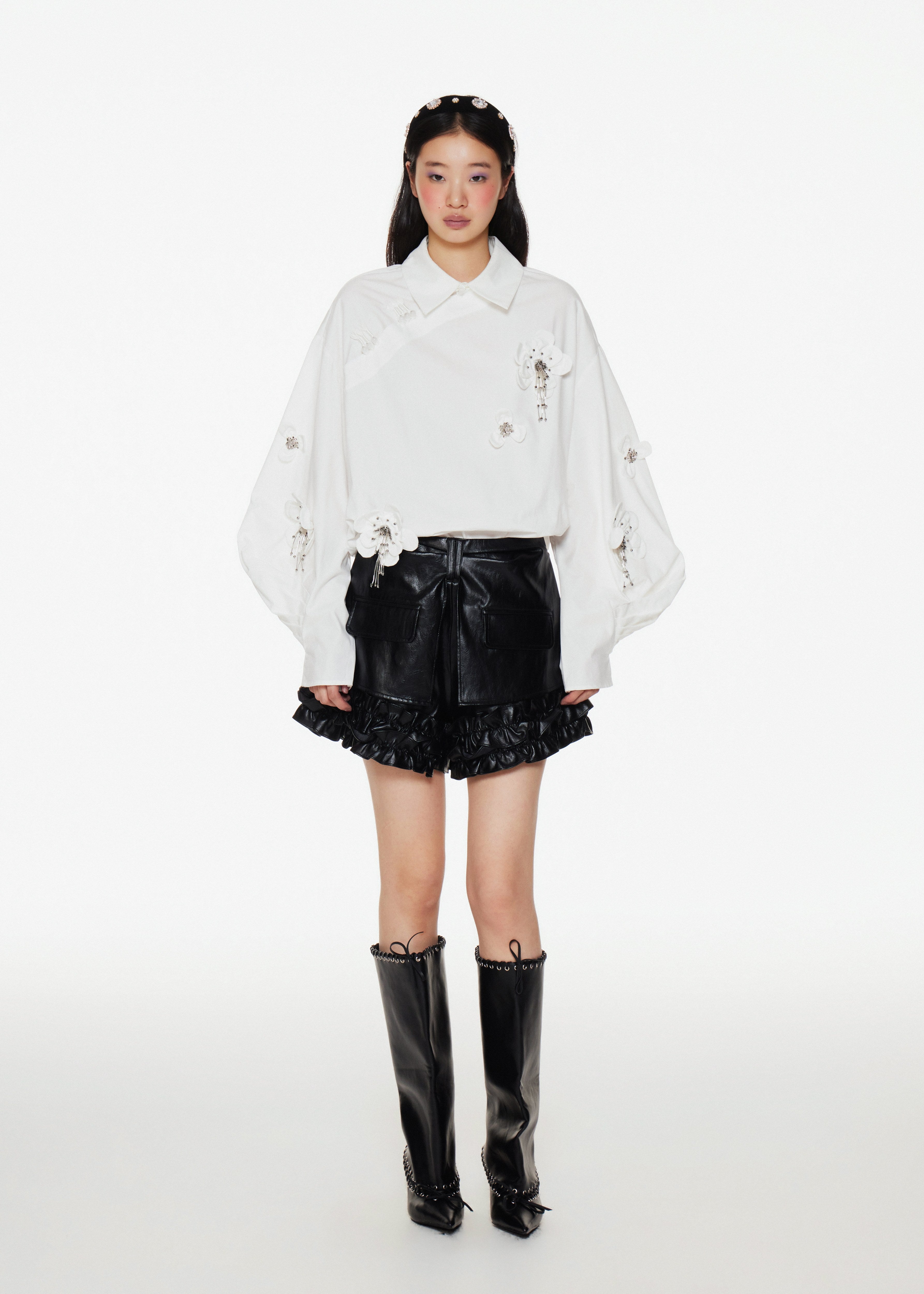 Black Faux Leather Shorts With Ruffle Enhancements